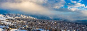 Aerial view of University of Utah campus and mountains in the winter.